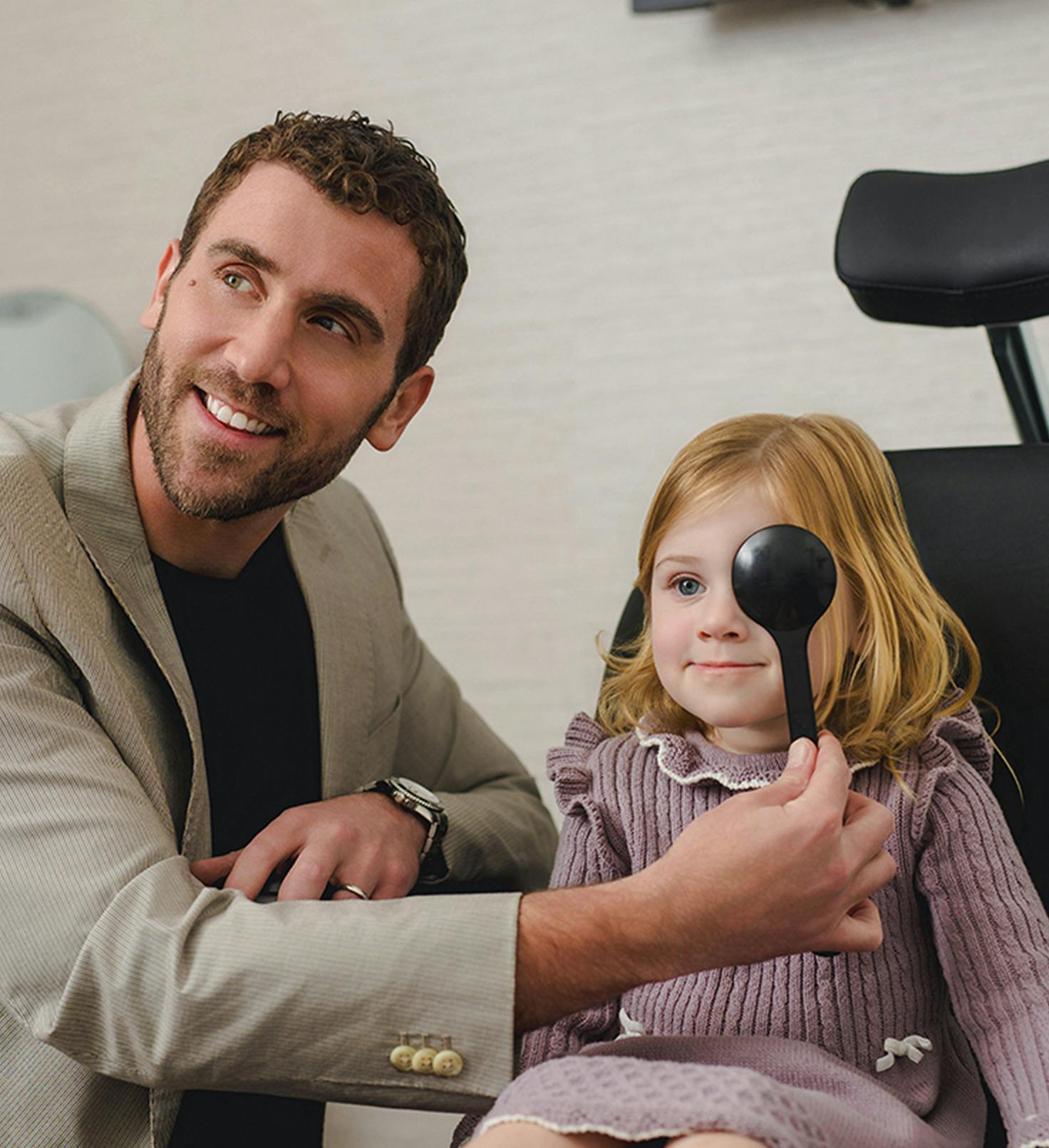Doctor helping a child