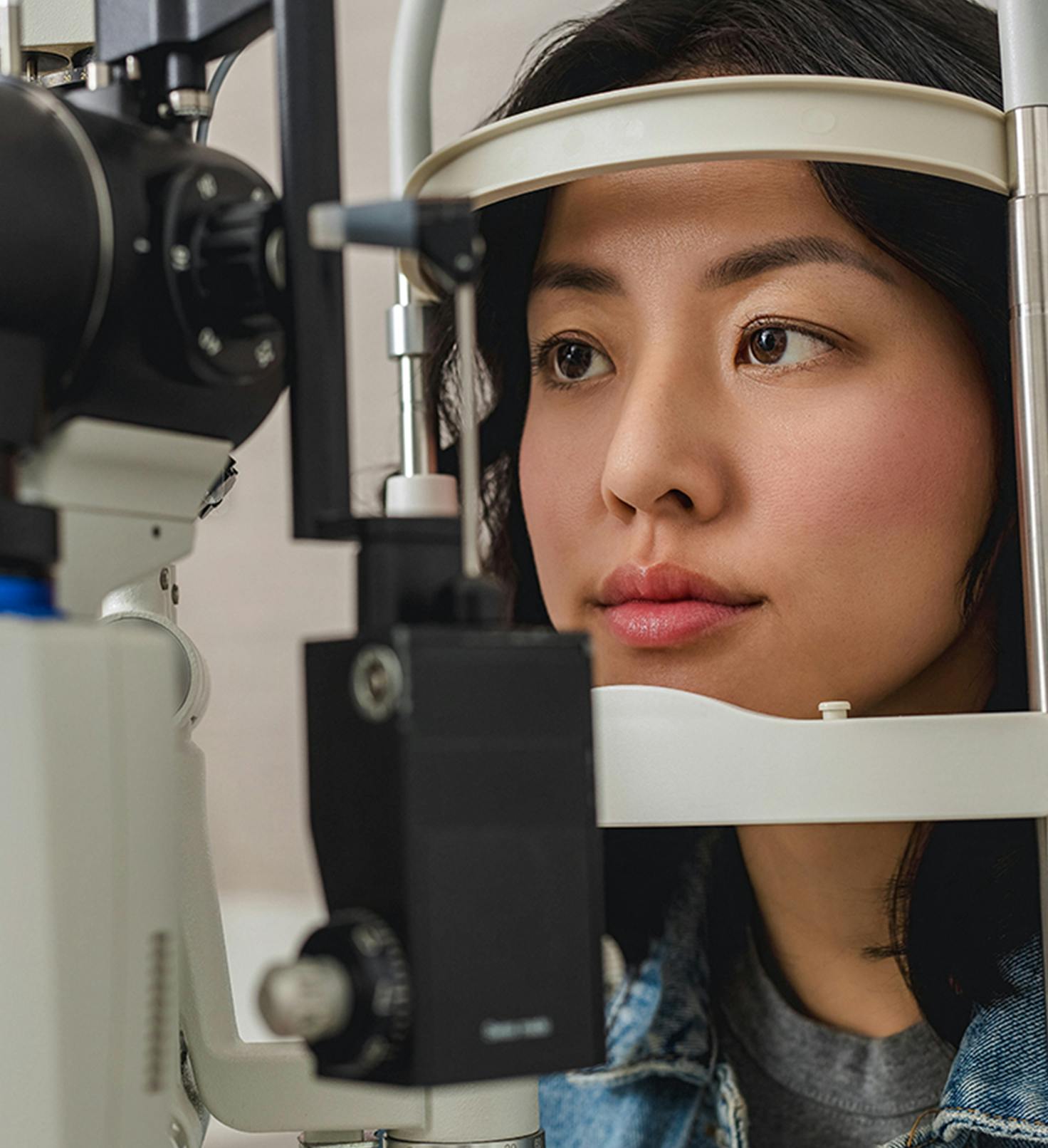 Woman getting an eye exam done