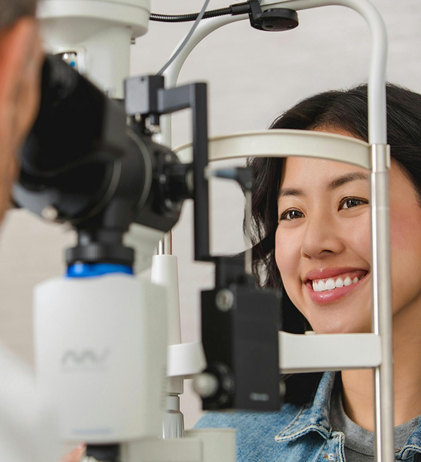 Woman smiling during eye exam
