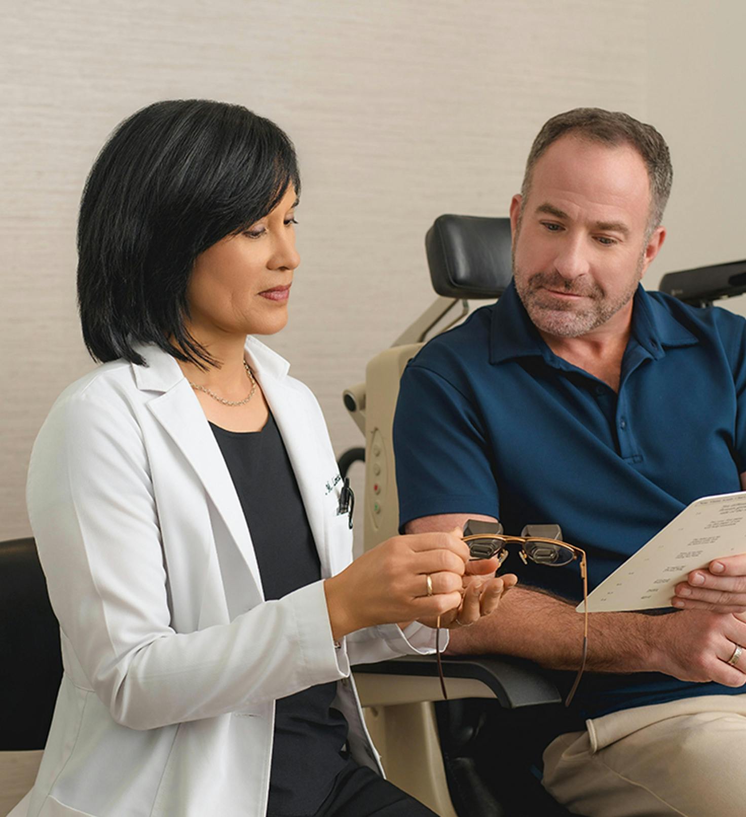 doctor helping a patient