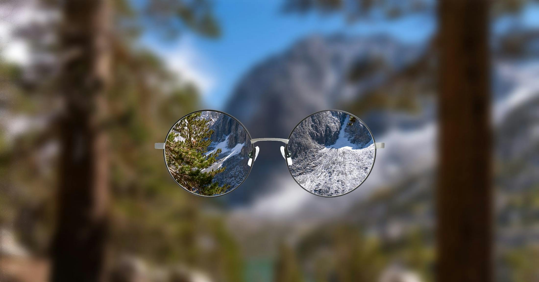 glasses and mountain