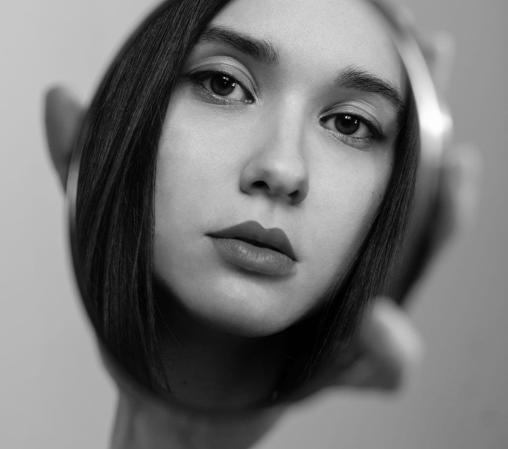 Woman's face in a mirror