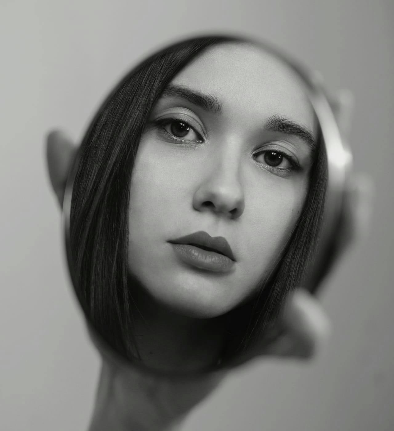 woman's reflection in mirror