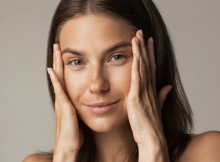 Women holding her face