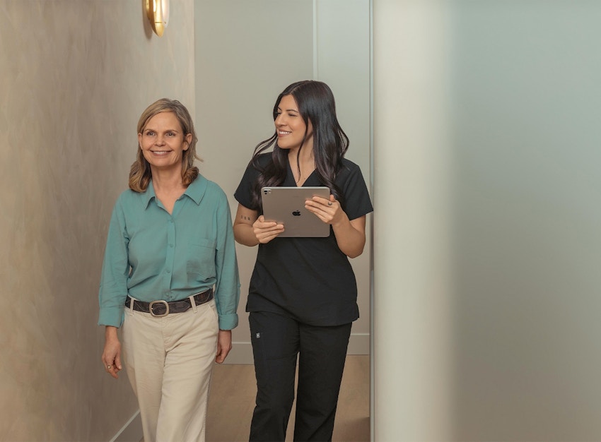nurse and patient walking
