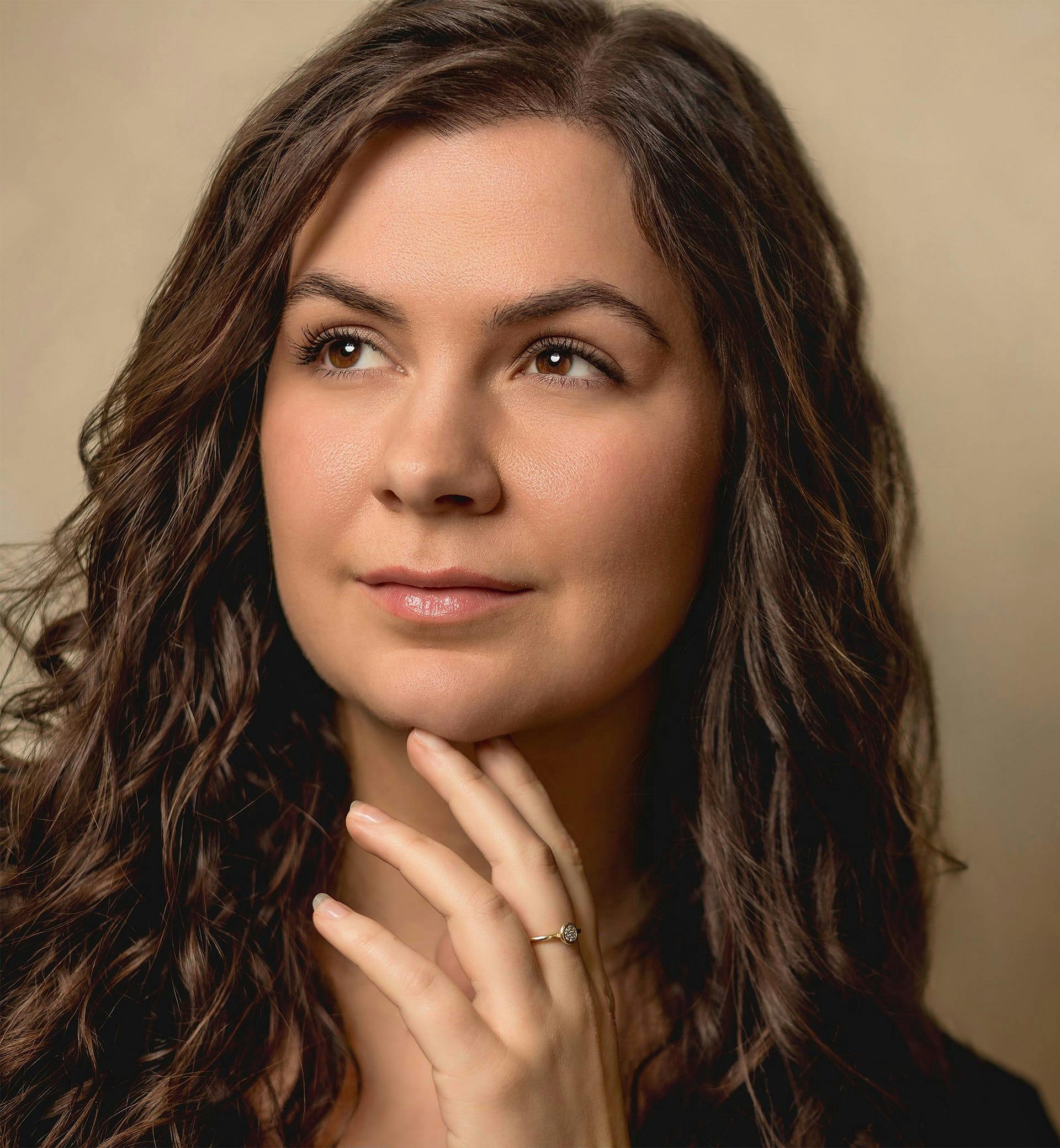 woman with brown curly hair