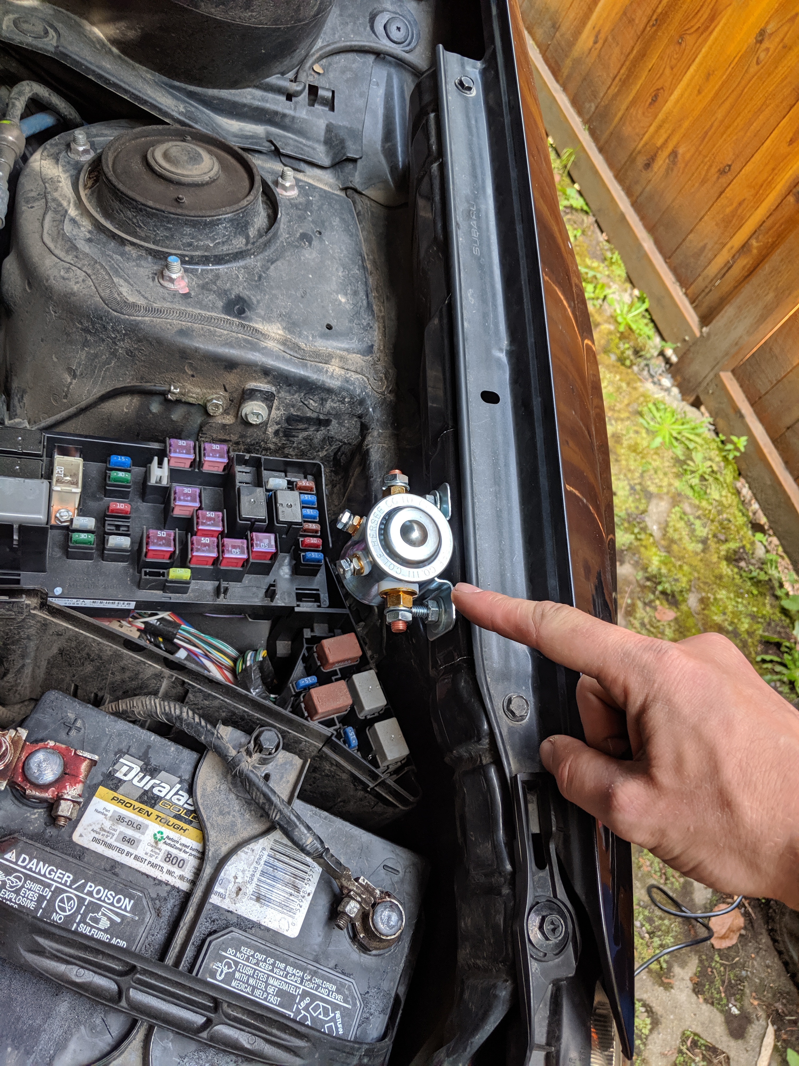 Solenoid mounted under the hood