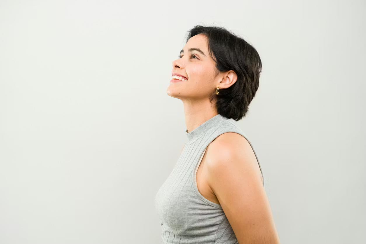 woman smiling turned to the side