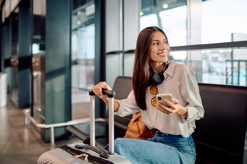 Woman sitting down in the airport