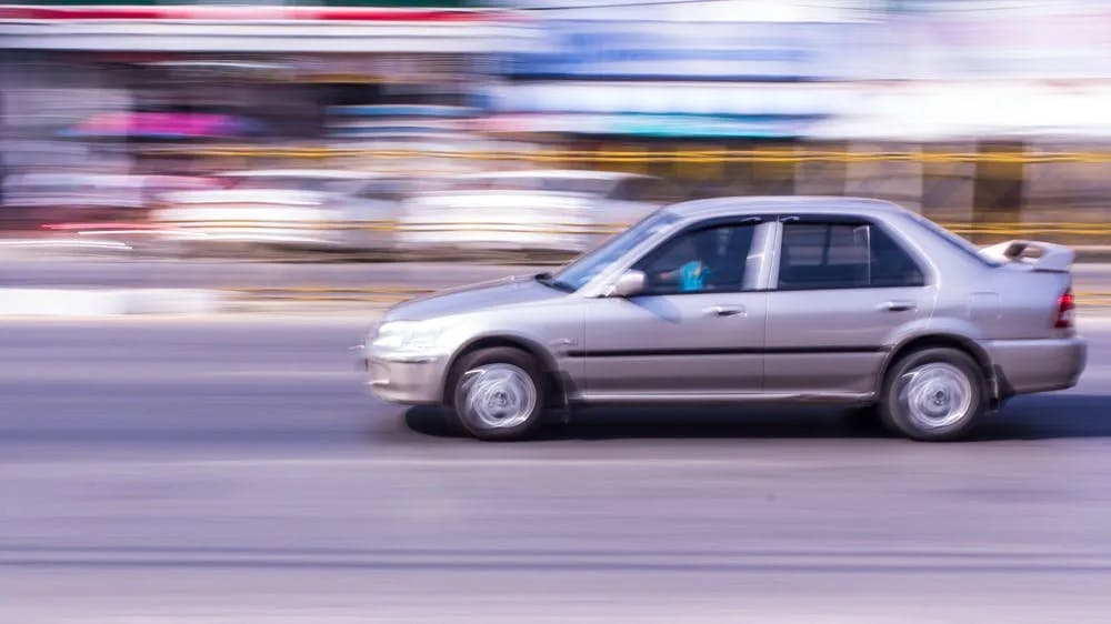 Speeding Car Car speeding through a residential area