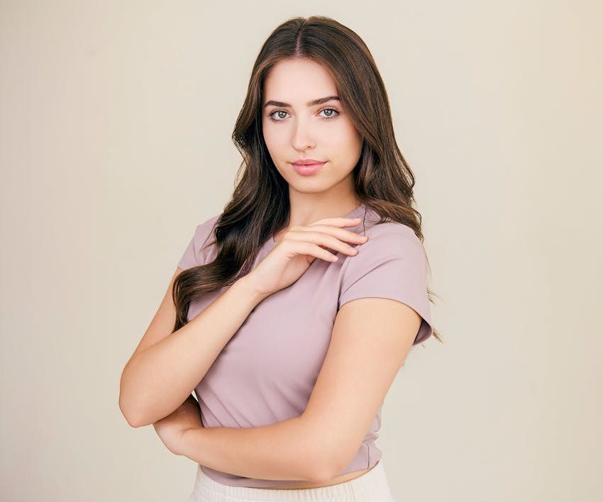 woman touching shoulder