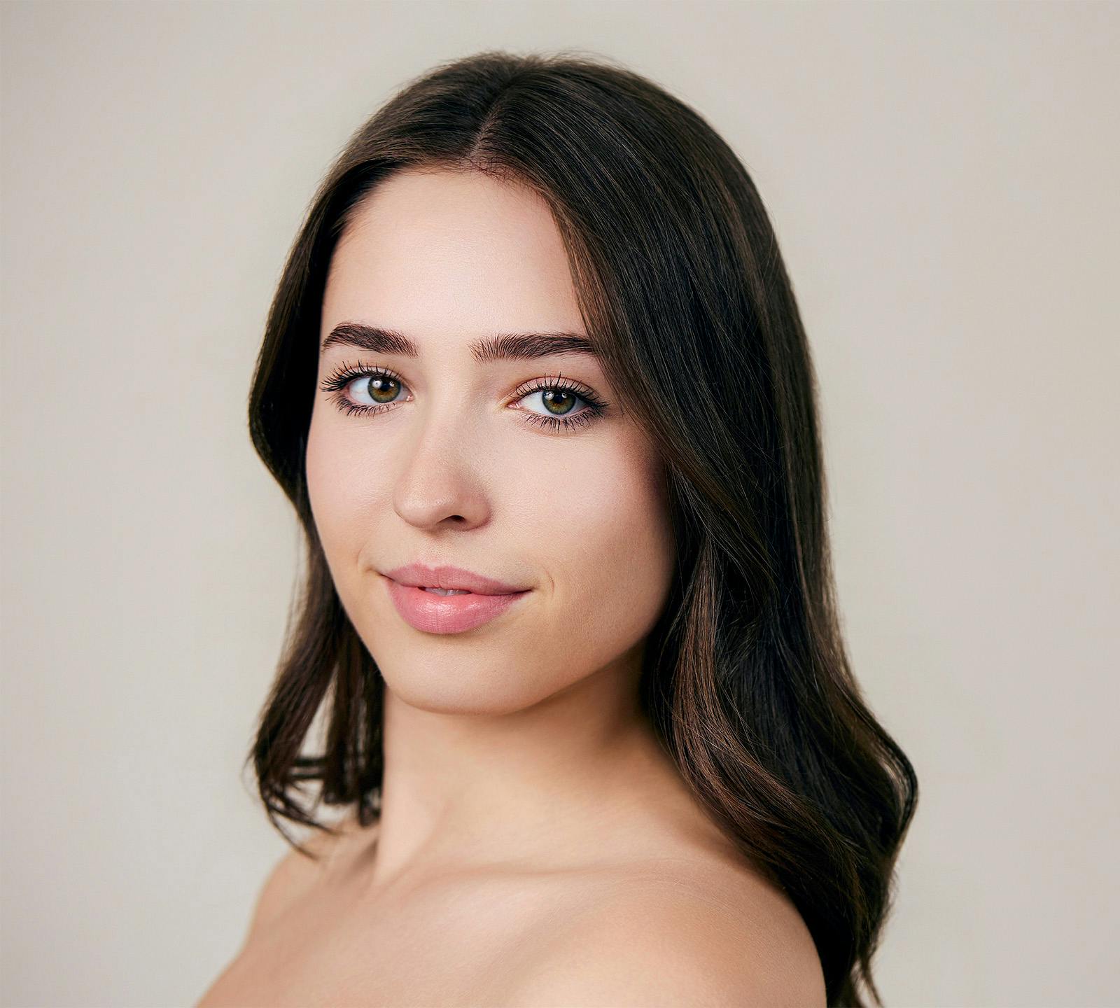 woman with soft smile