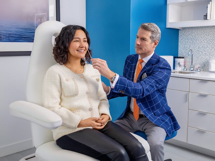 Doctor helping a patient