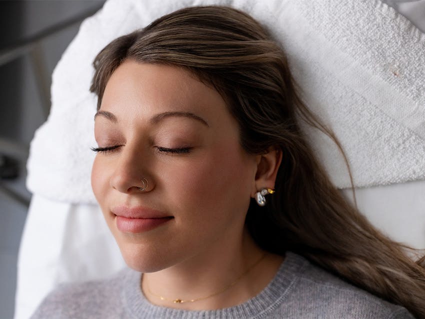 Woman with her eyes closed