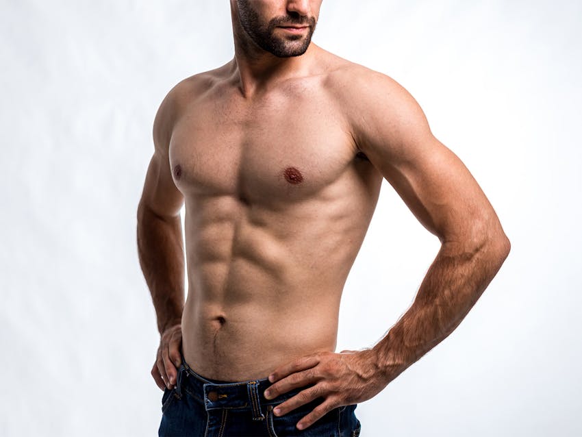 A man posing with his hands on his hips