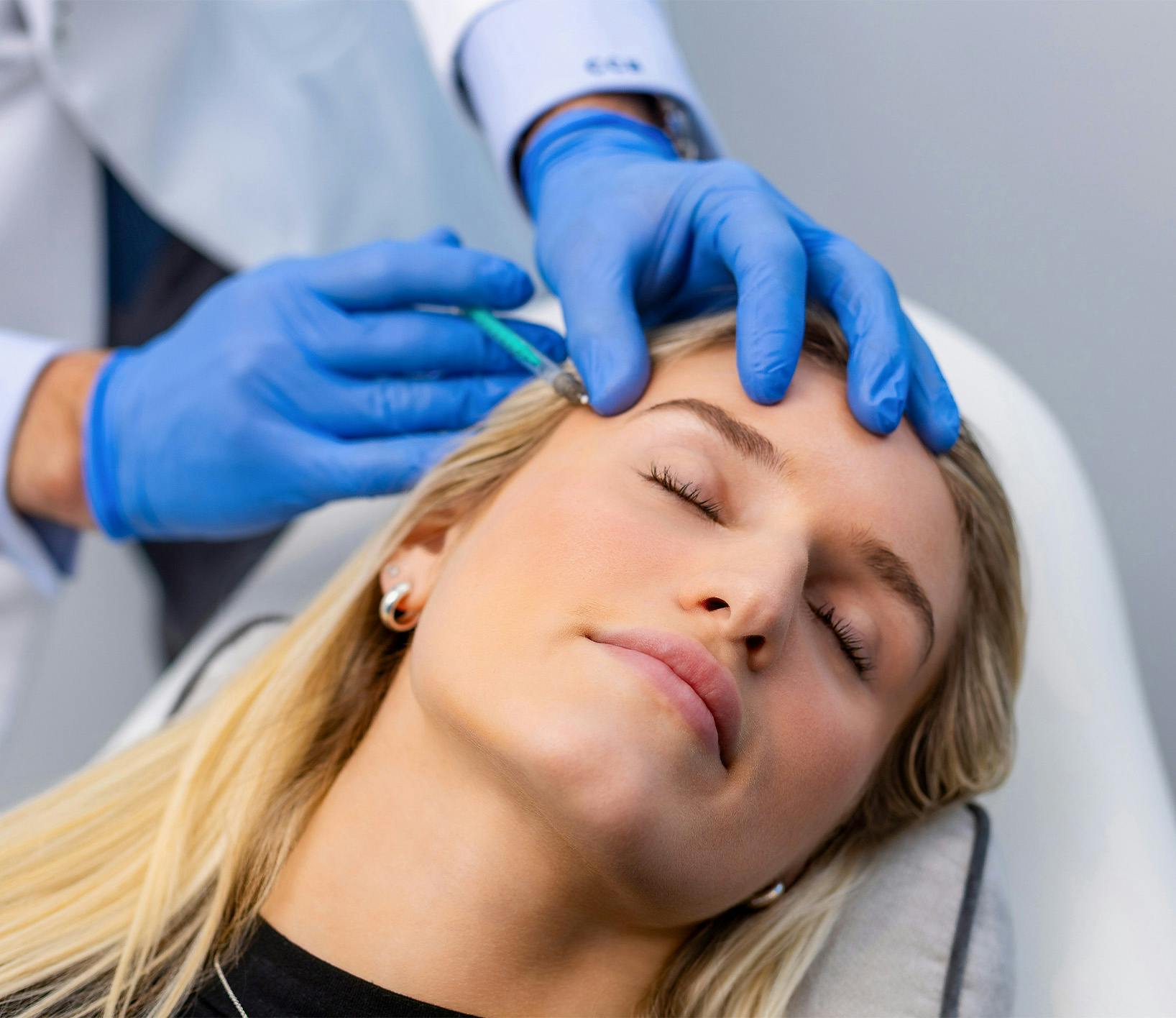 Woman getting an injection