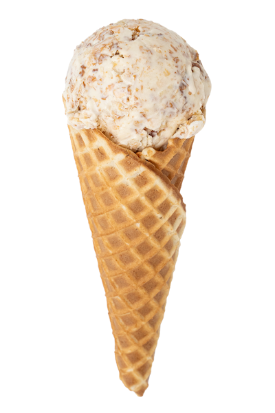 Scoop of Almond Croissant ice cream in a waffle cone. The ice cream is creamy with visible almond pieces and pastry bits.