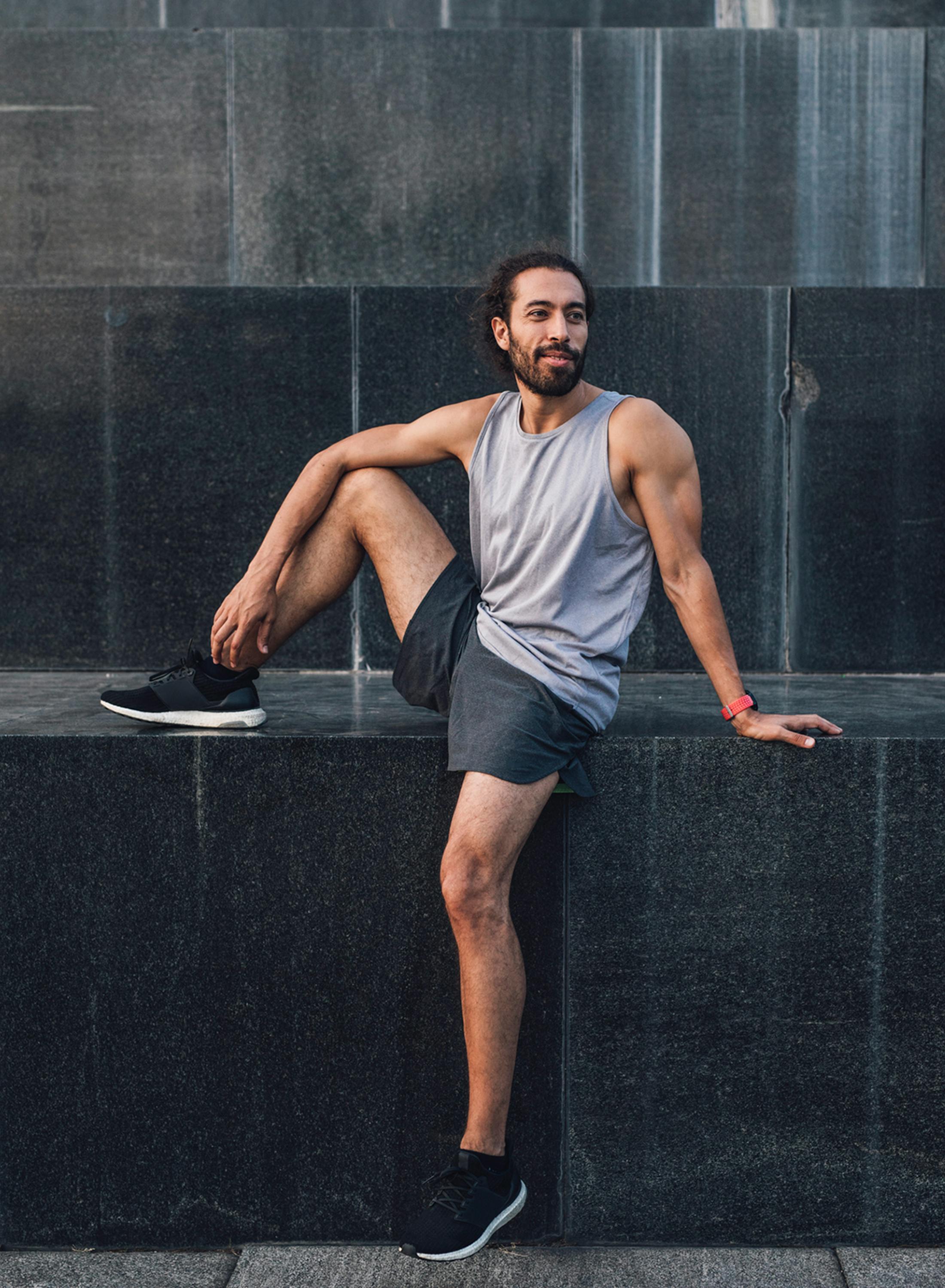 man sitting on ledge