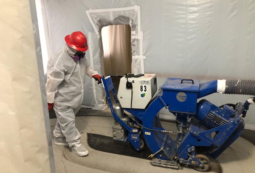 a worker operating a machine