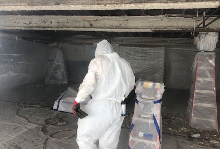 a worker in a basement