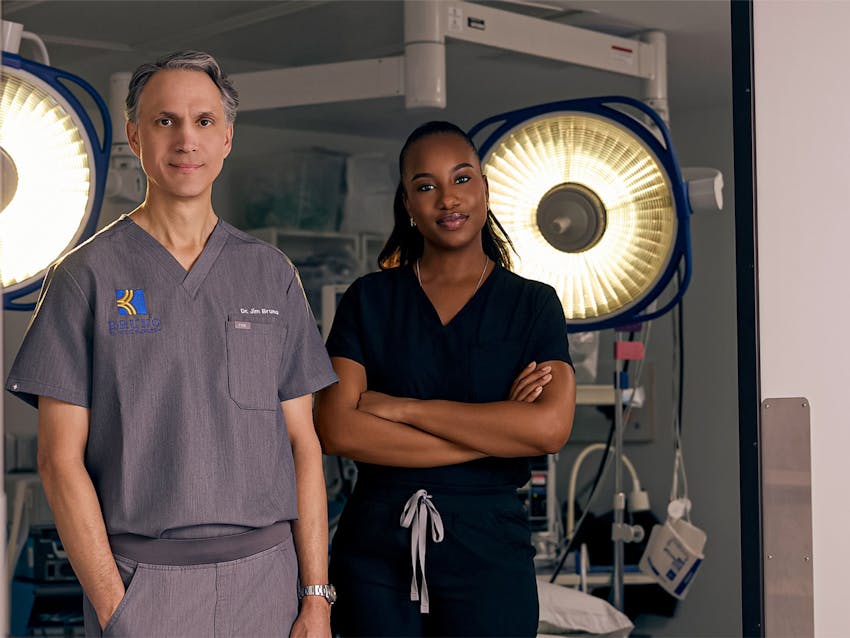 Doctors in front of surgical lights