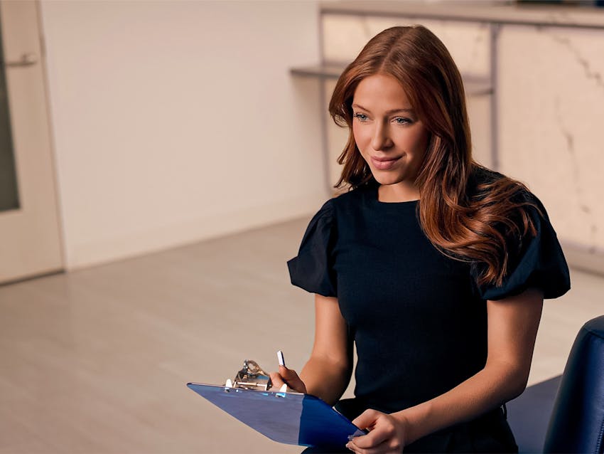 Woman filling out forms
