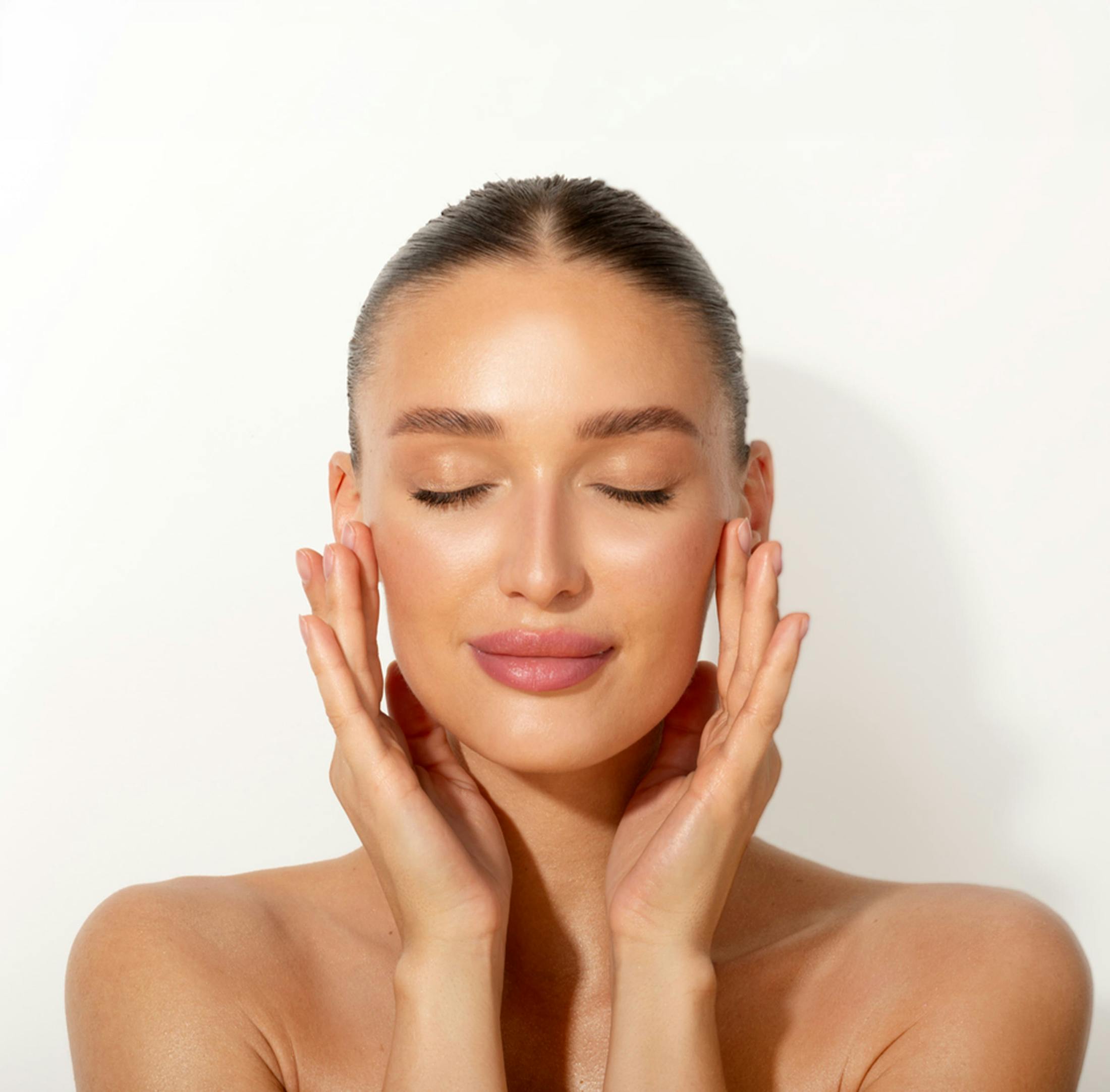 Woman touching her cheeks