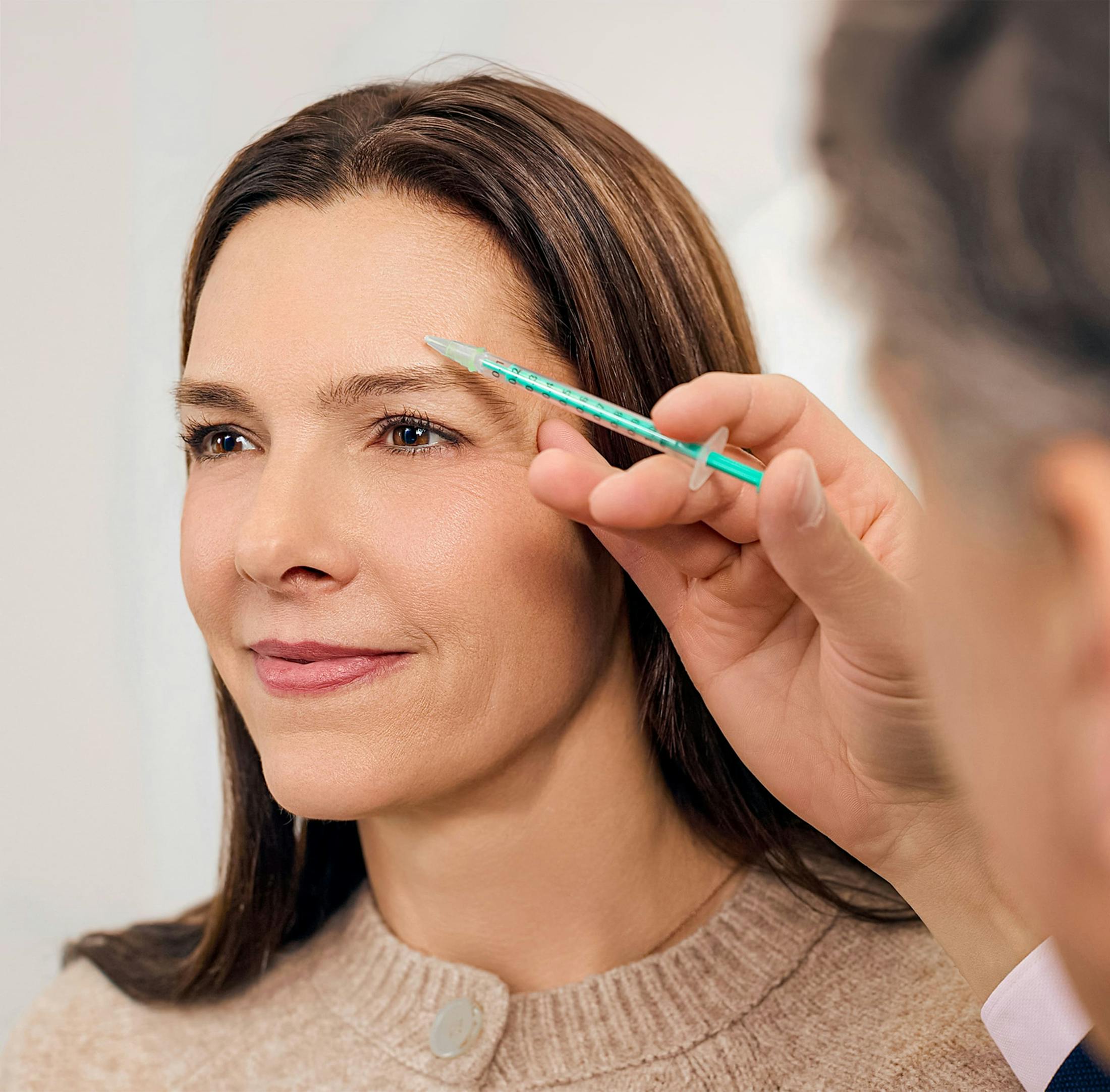 Woman and doctor during treatment