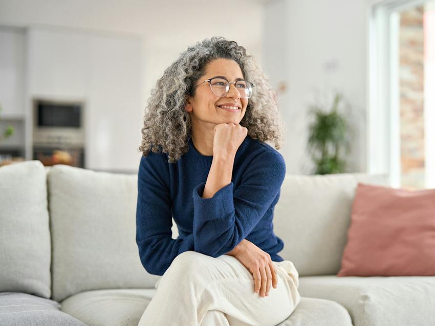 woman resting chin on fist
