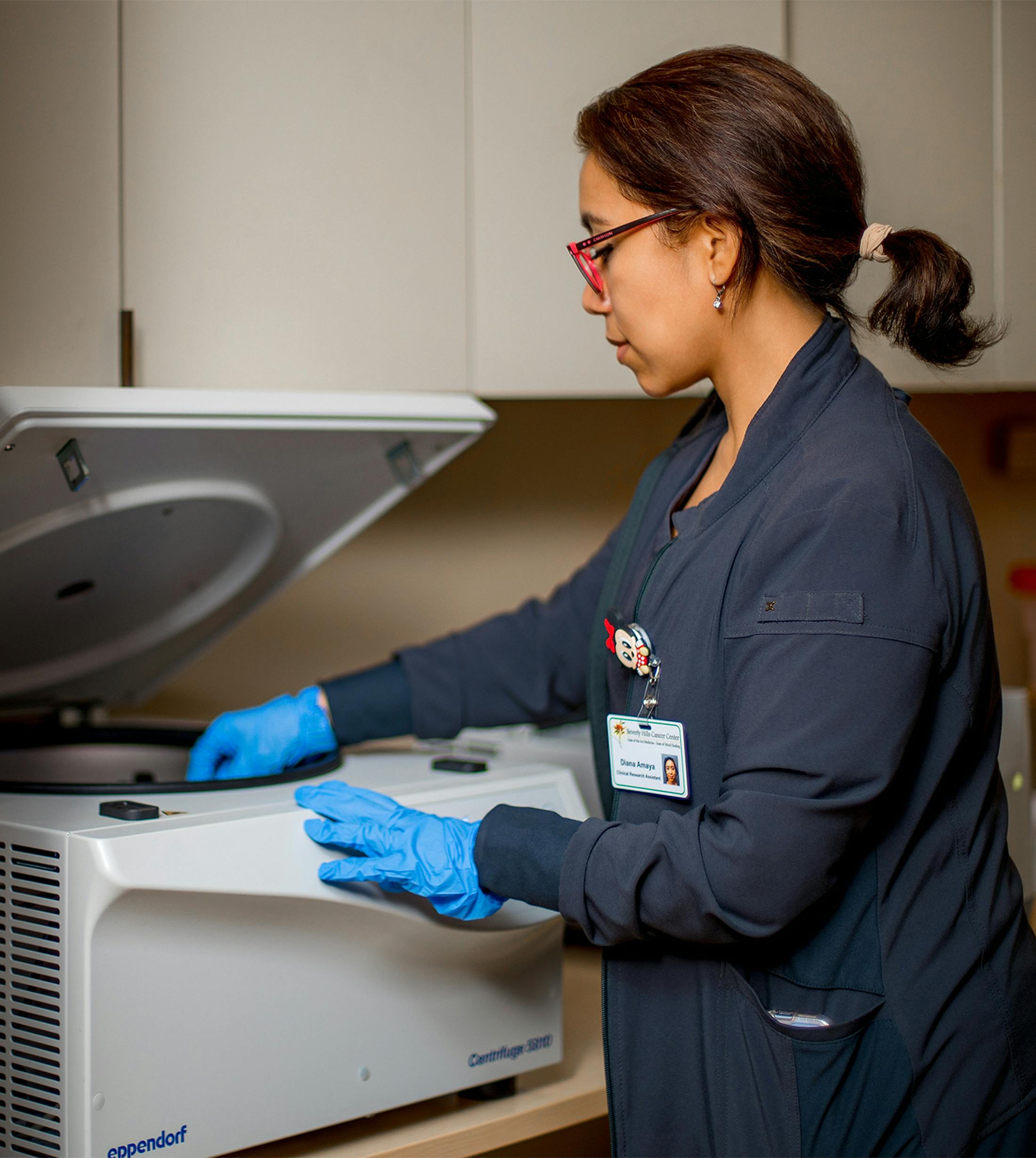 woman with hands in machine