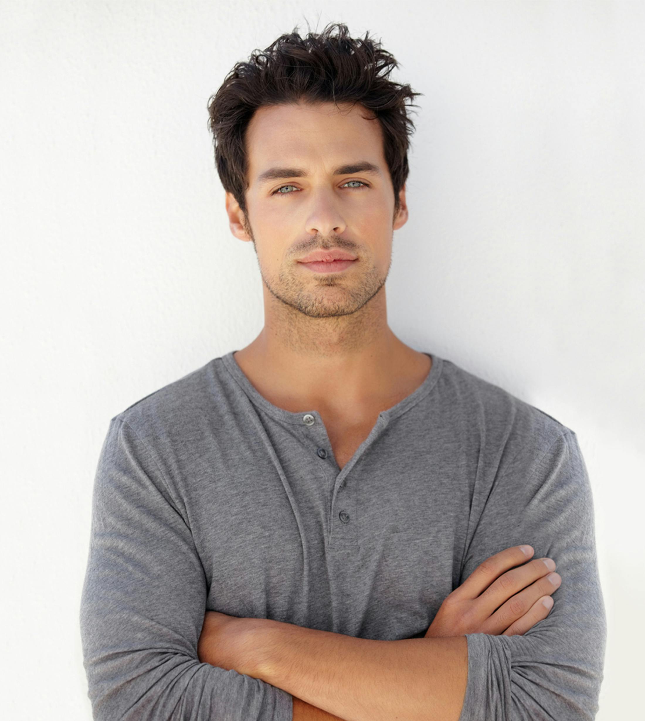 man with his arms crossed