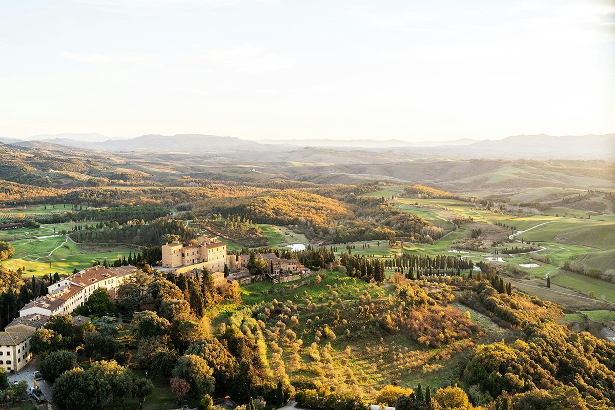 Aerial View of Tenuta Toscana Aerial View of Tenuta Toscana with Buildings and Surrounding Green Space