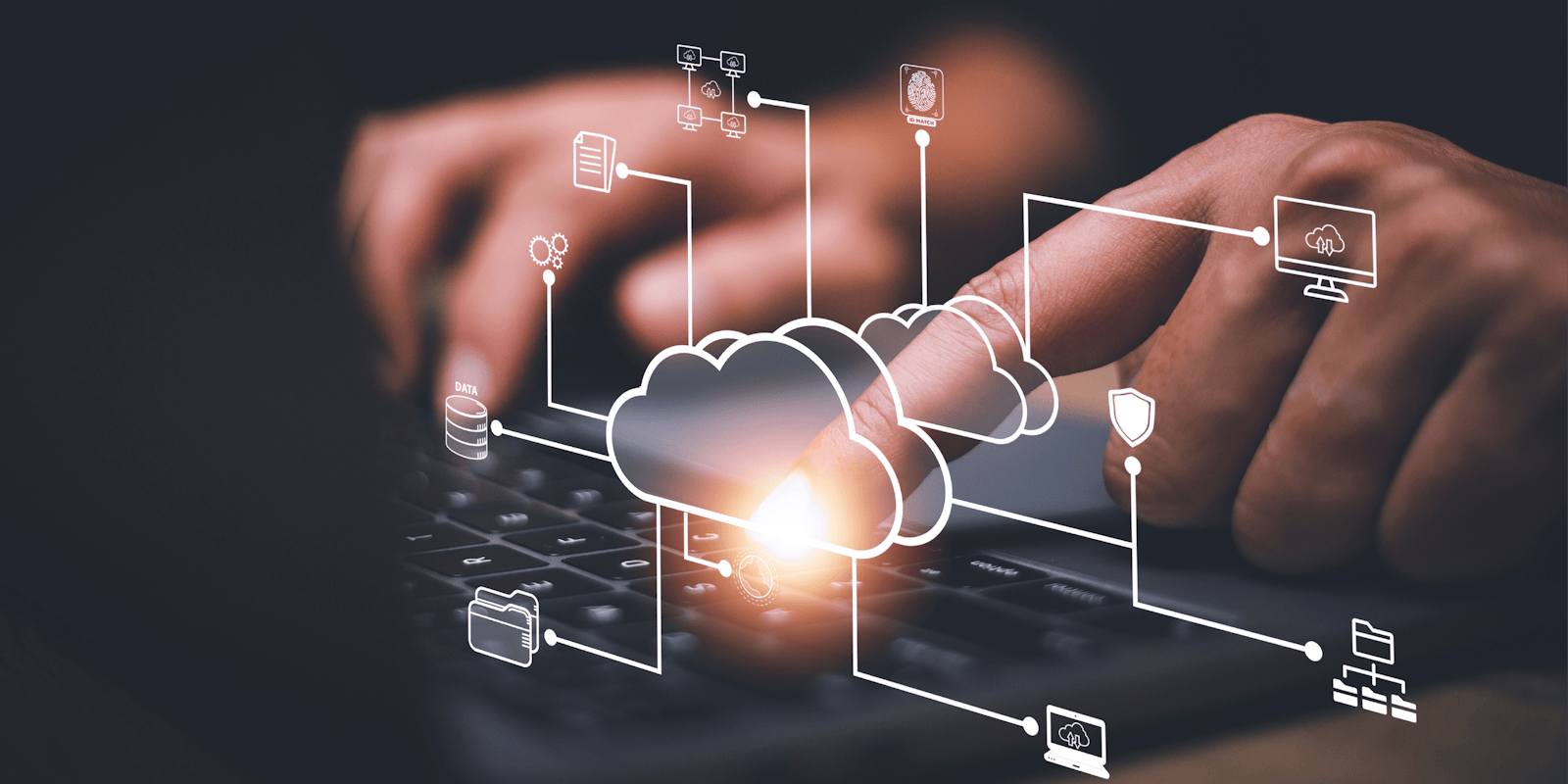 Illustration of cloud integrations connecting multiple business systems above a keyboard, representing embedded iPaaS for SaaS growth and application connectivity.