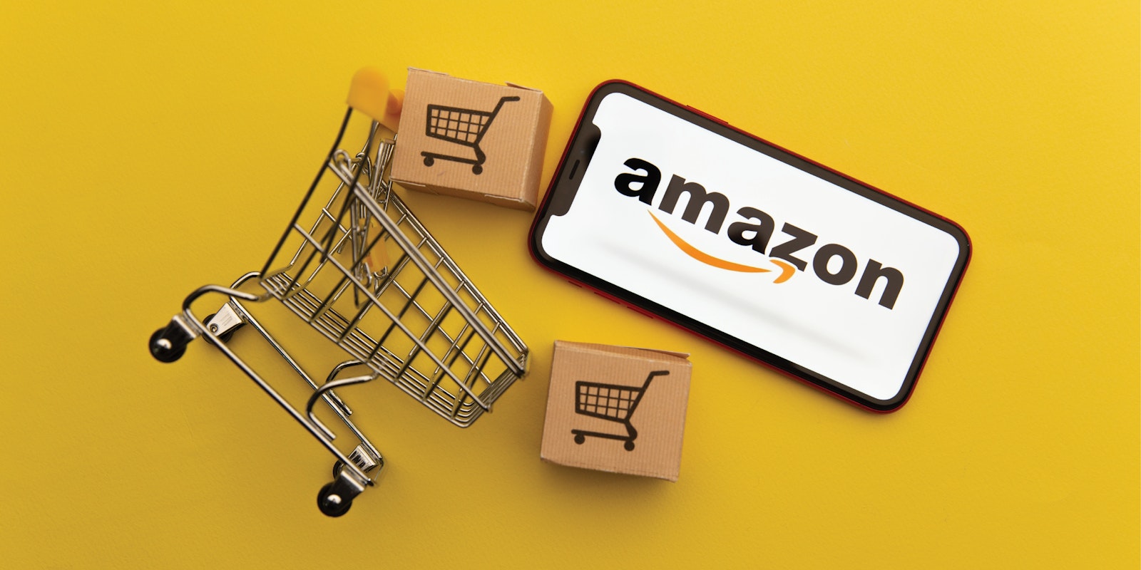 Amazon FBA and NetSuite integration graphic featuring a mobile shopping interface, shopping cart, and product boxes representing ecommerce inventory management and automated data connectivity.