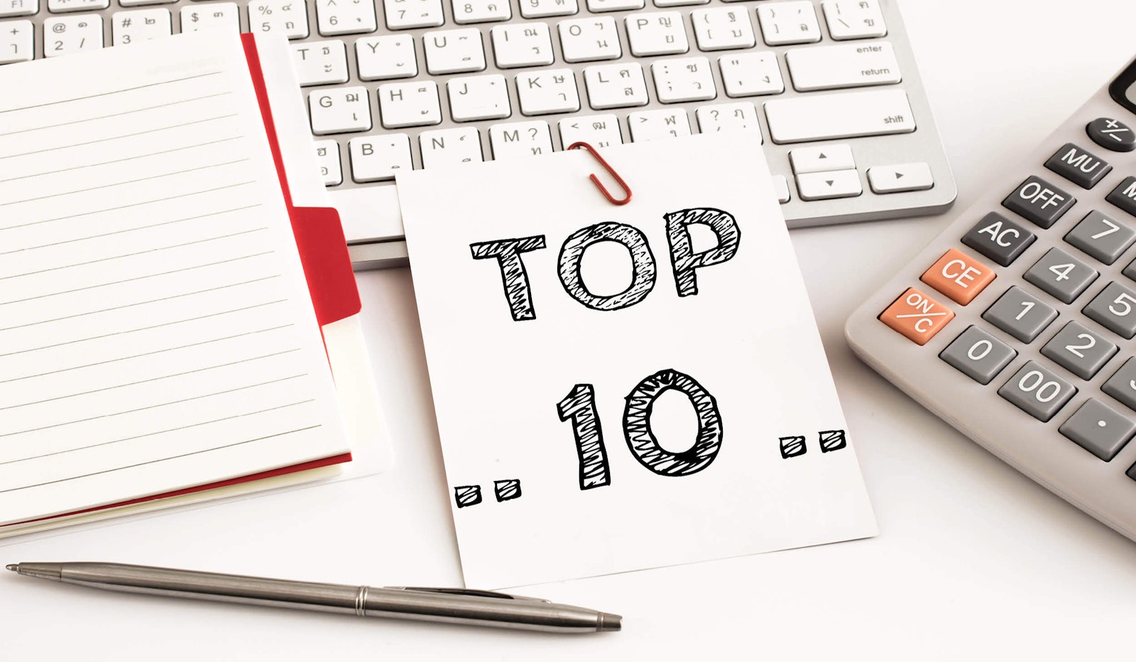 Graphic featuring a note paper with "Top 10" text, symbolizing a guide to using MindCloud’s low-code automation platform effectively.