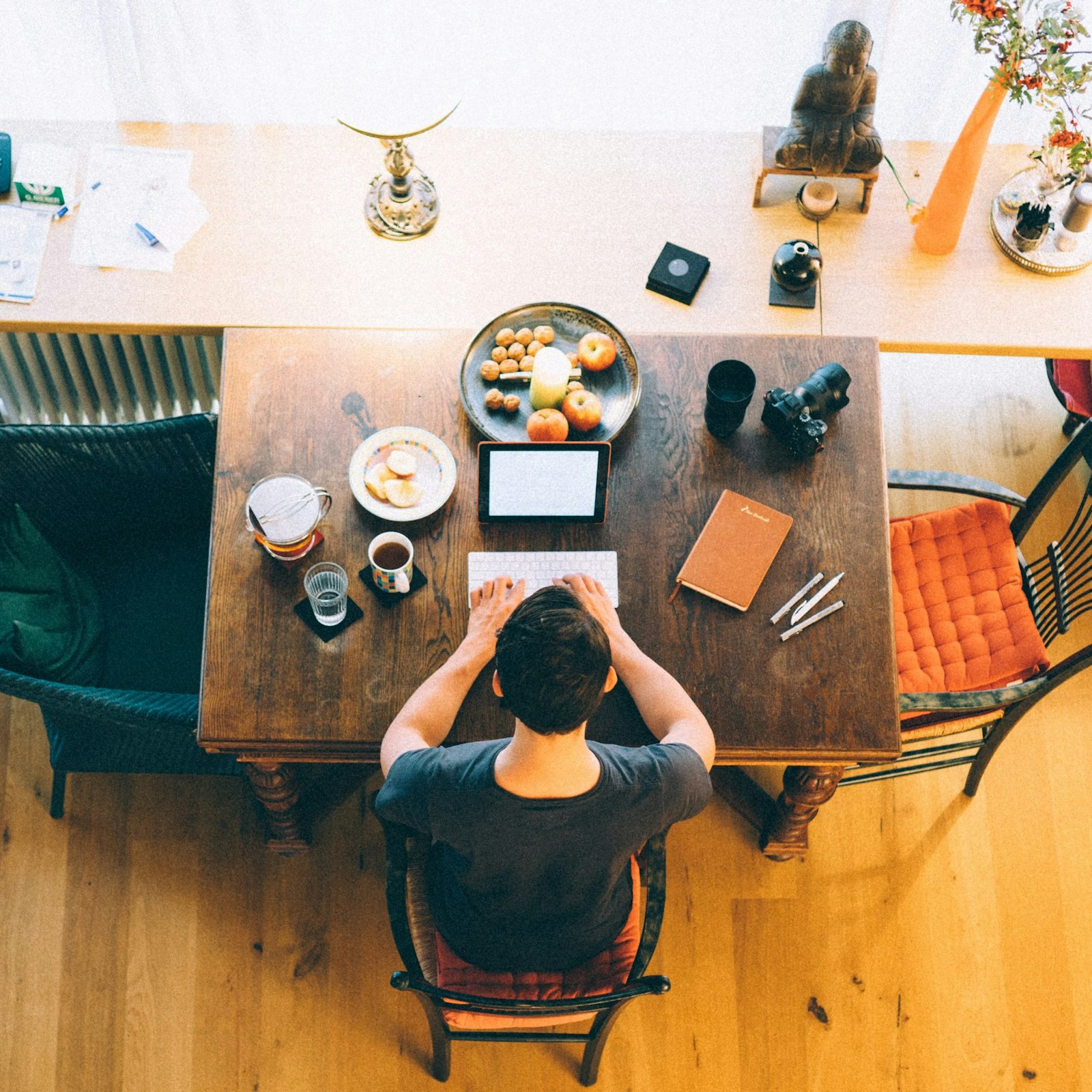 Image of a person working on a laptop, highlighting software integration, workflow automation, and operational efficiency.