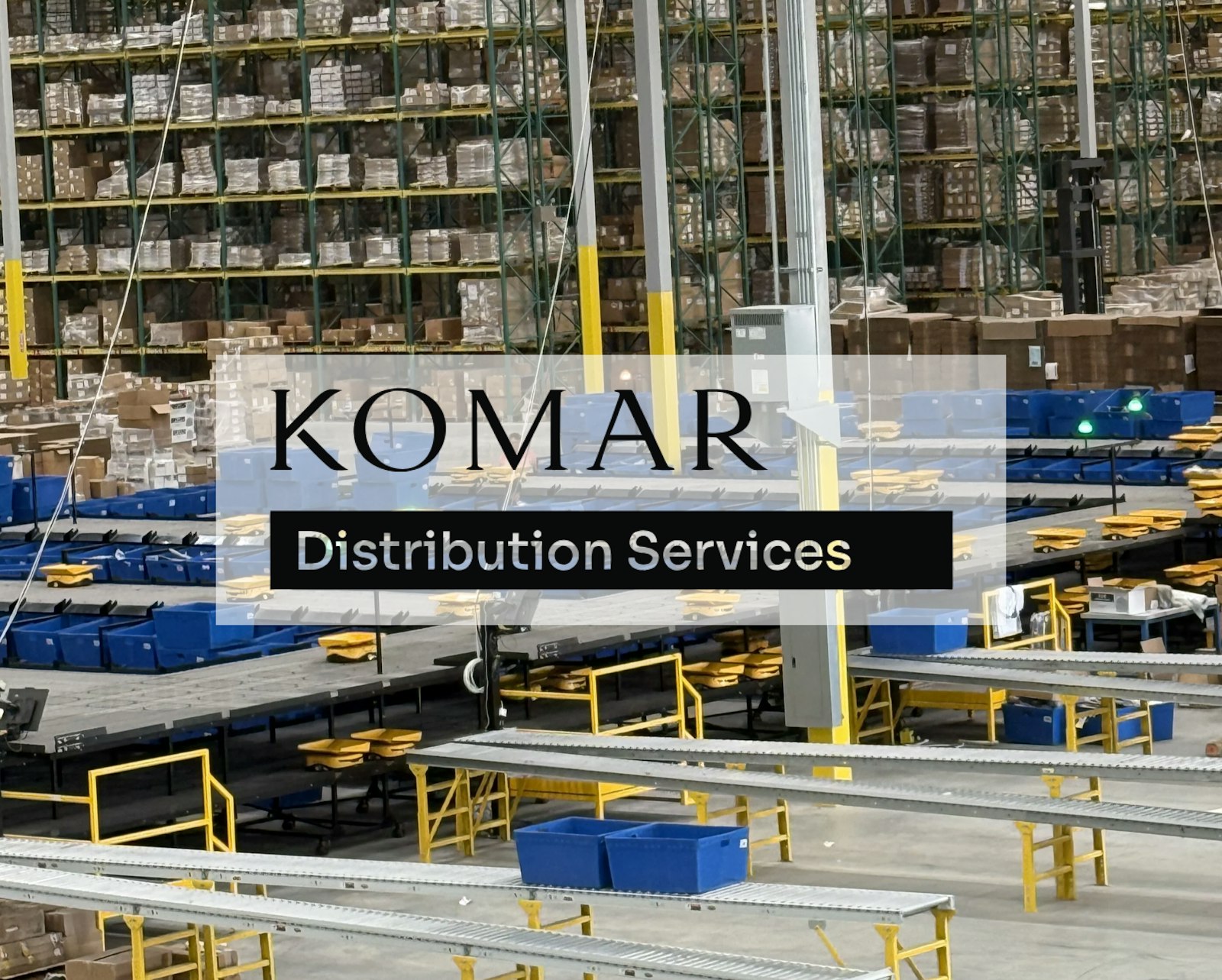 Komar Distribution Center with Komar logo