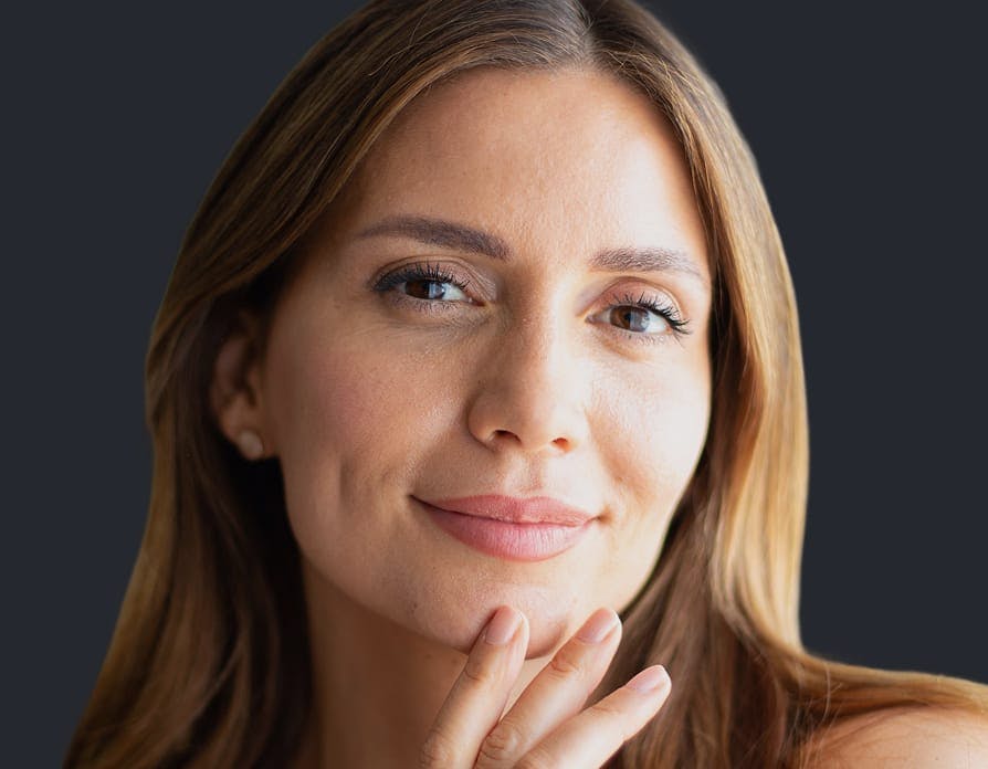 Woman touching chin
