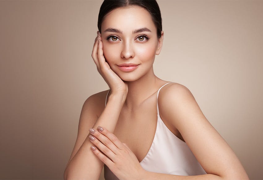 women with hand on chin
