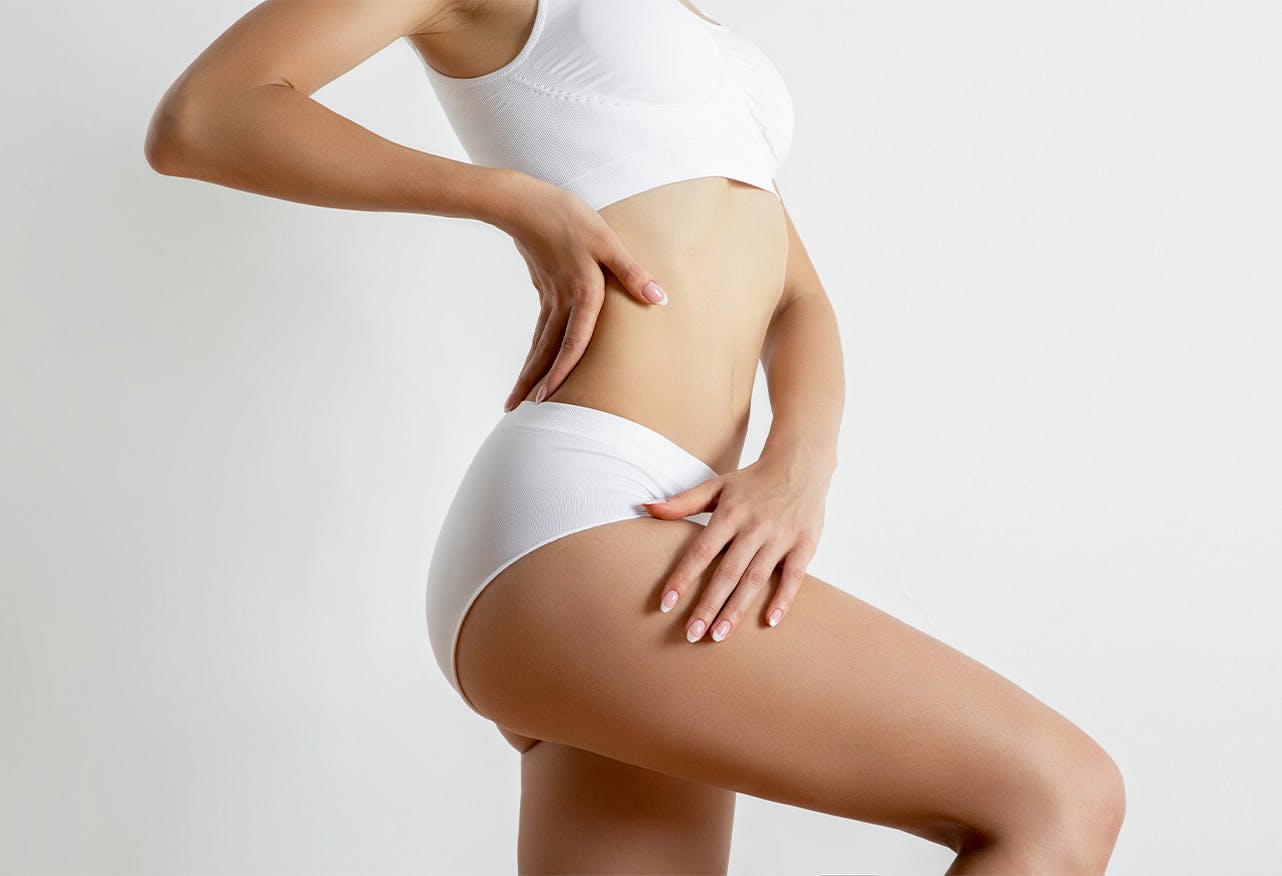 women with hand on back and thigh