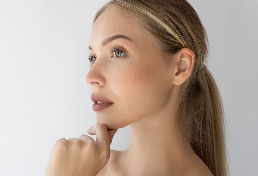 women hand on chin