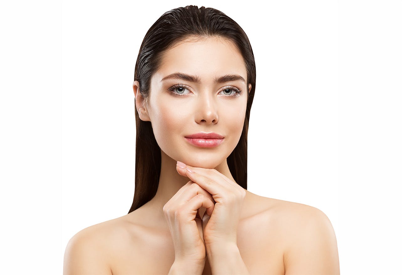 women with hands on chin