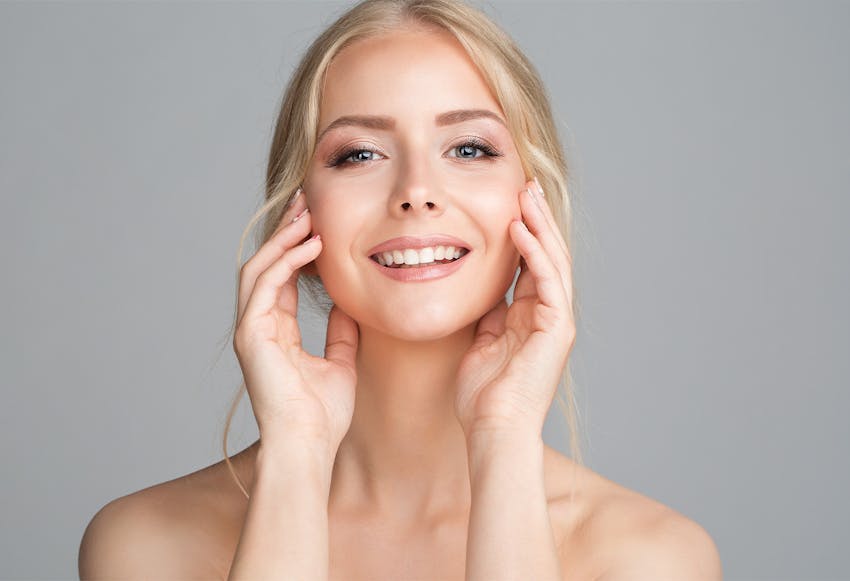 women hands on face