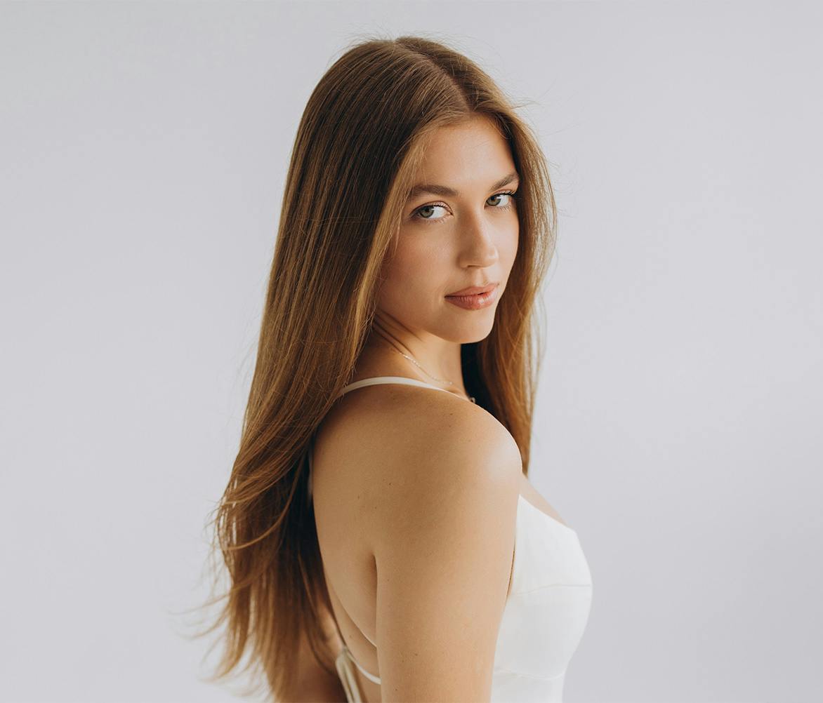 Woman looking over her shoulder