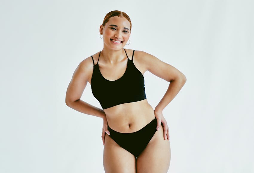 smiling woman in black underwear