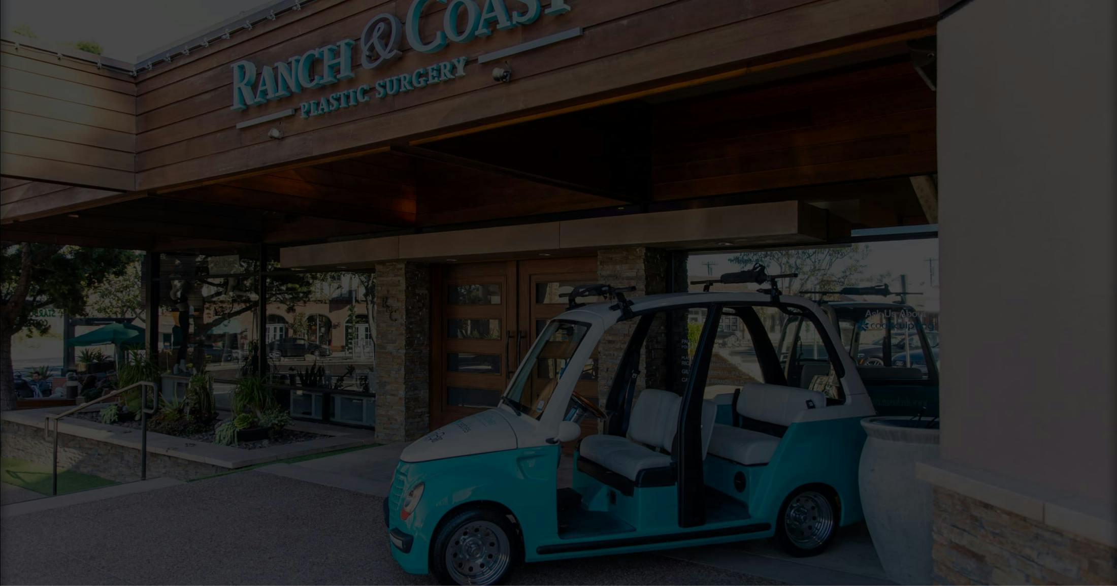 Cute blue car parked outside of Ranch & Coast Plastic Surgery