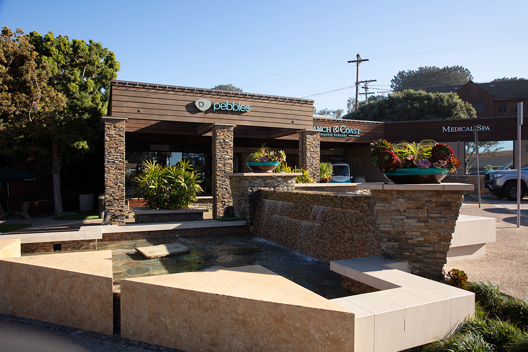 View of Ranch & Coast Plastic Surgery and nearby storefronts