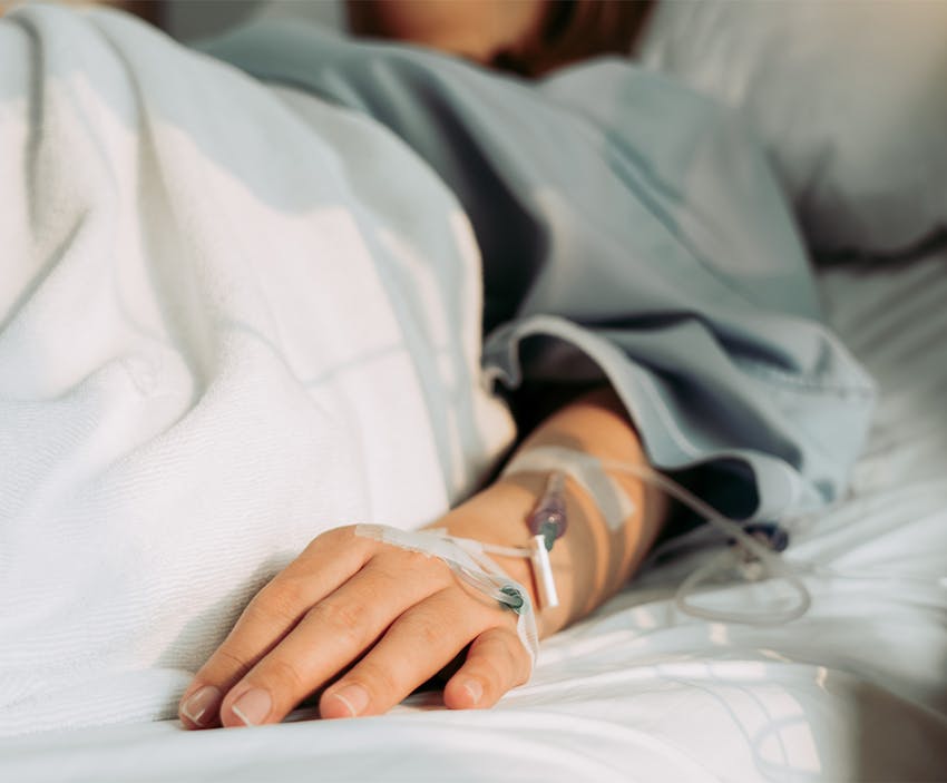 Person with an iv in their arm