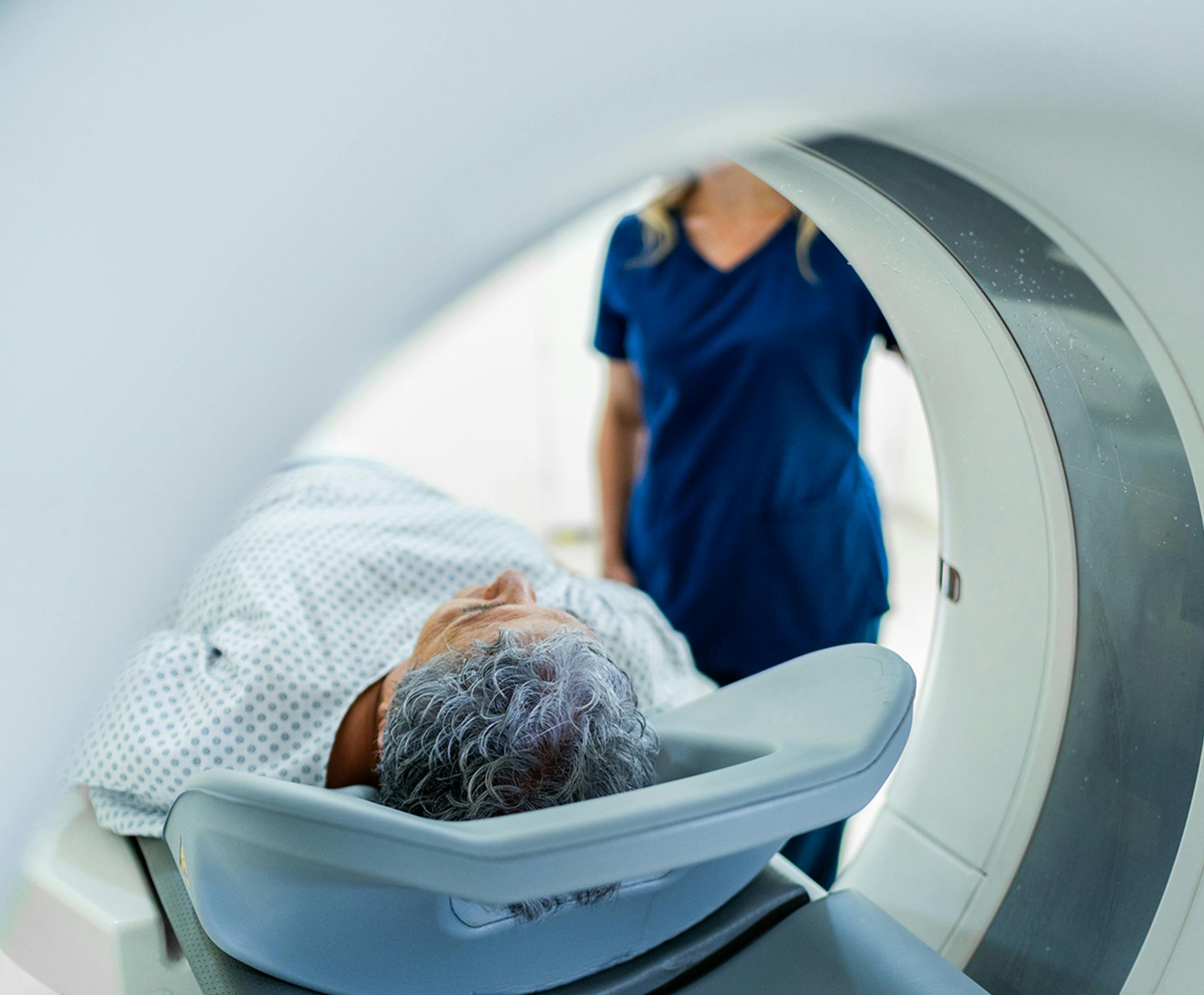 man being put in an MRI machine
