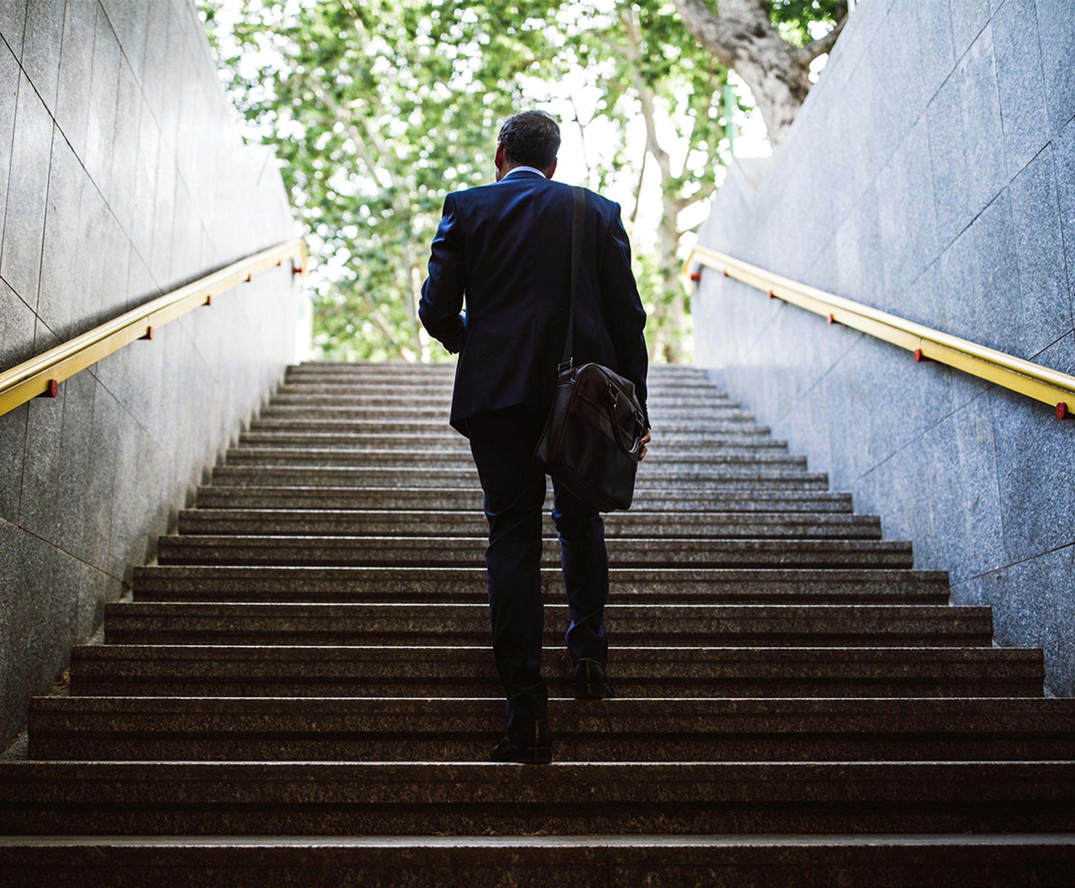 Man walking up stairs